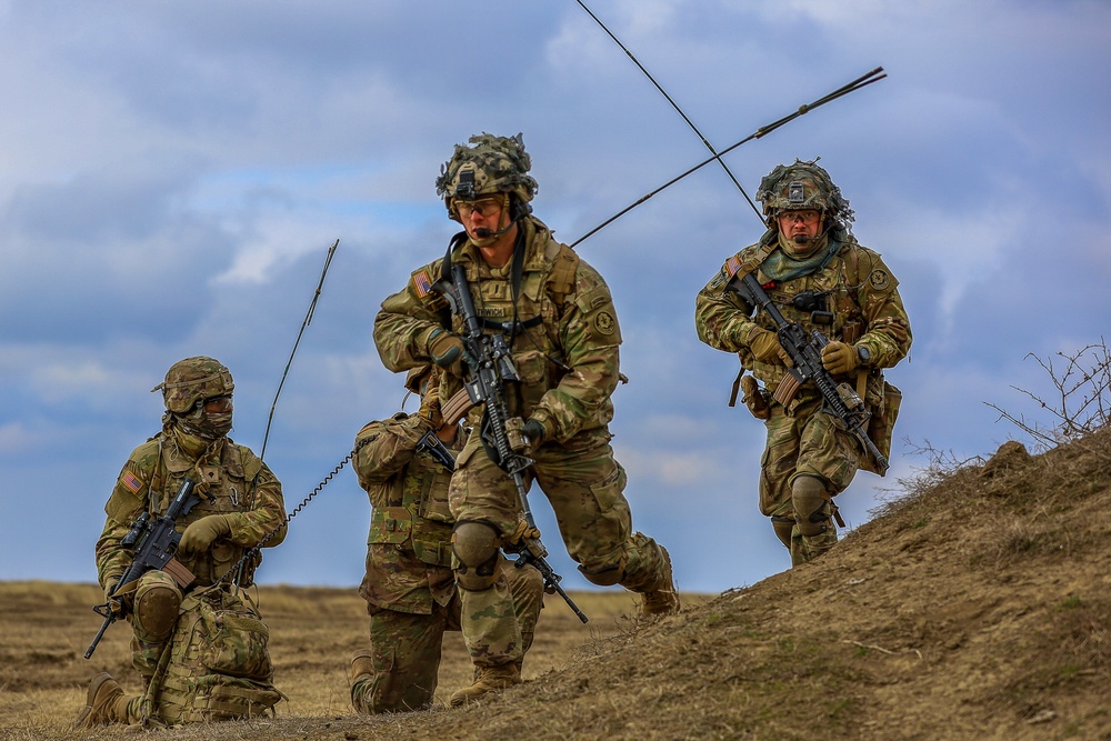 U.S. Army Soldiers work with Romanian forces during a Combined Arms Live Fire Exercise.