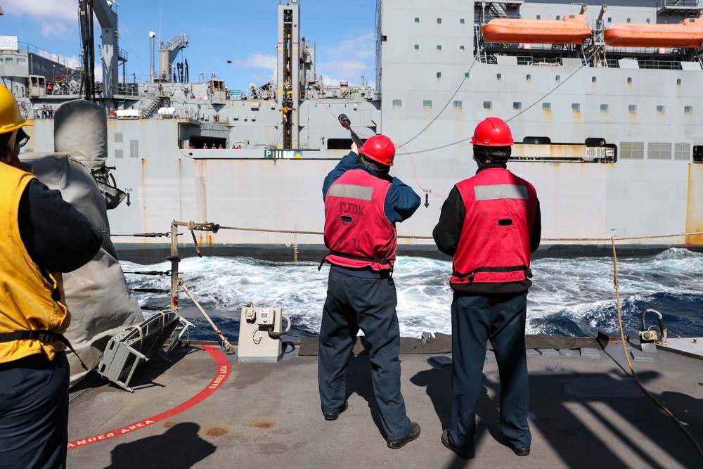 USS Ross replenishes at sea with USNS Robert E. Peary