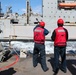 USS Ross replenishes at sea with USNS Robert E. Peary