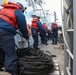 USS Ross replenishes at sea with USNS Robert E. Peary