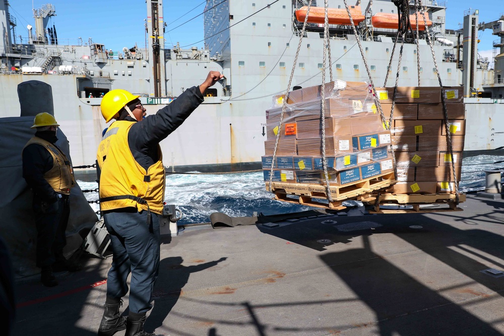 USS Ross replenishes at sea with USNS Robert E. Peary