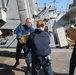 USS Ross replenishes at sea with USNS Robert E. Peary