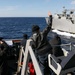 USS Ross replenishes at sea with USNS Robert E. Peary