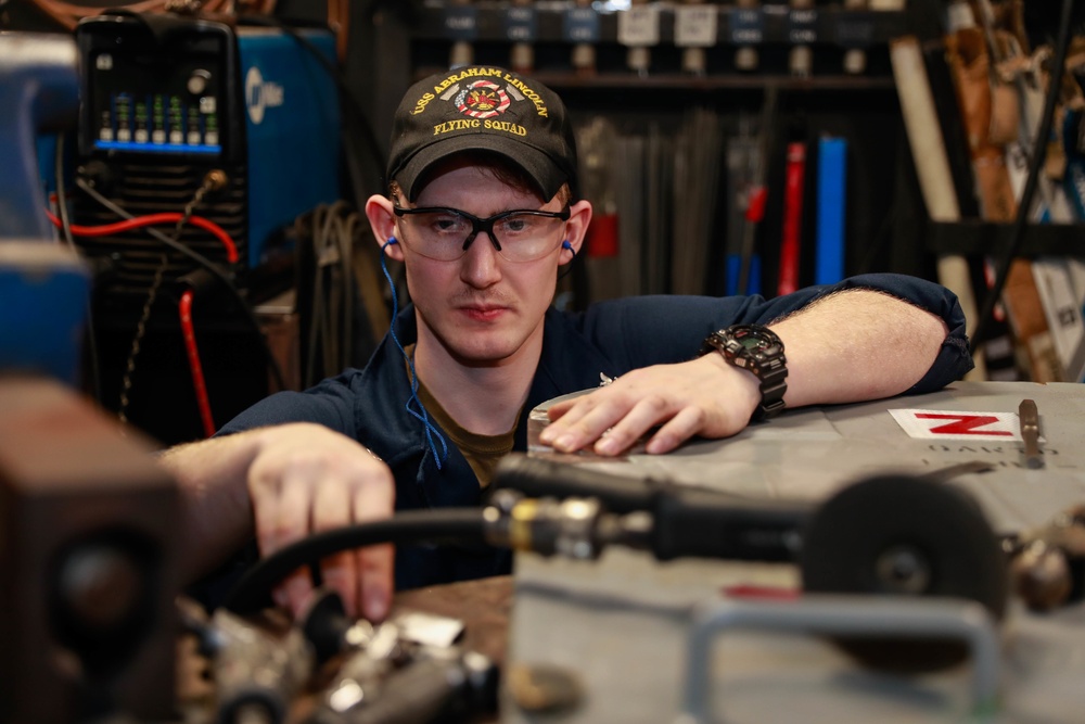 Abraham Lincoln Sailors conduct maintenance