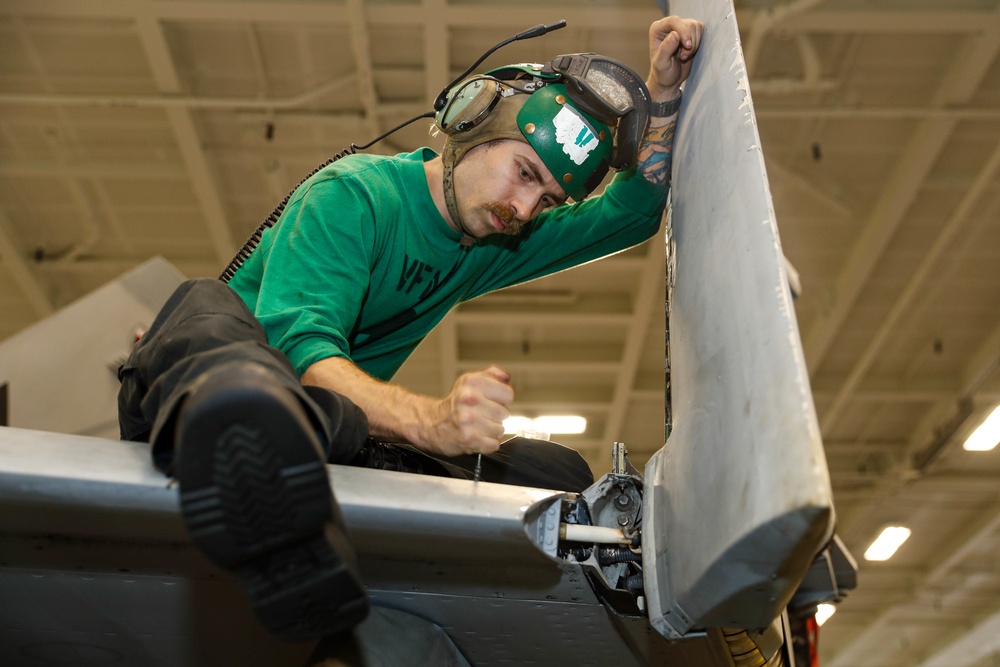 Abraham Lincoln Sailors conduct aircraft maintenance