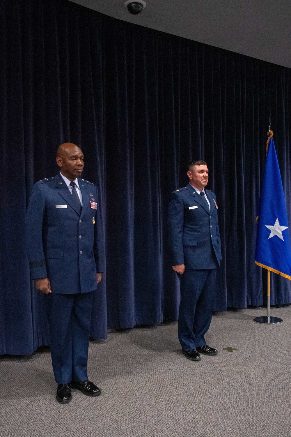 THE PROMOTION: Maj. Gen. Ondra Berry promotes Maj. Robert Kolvet