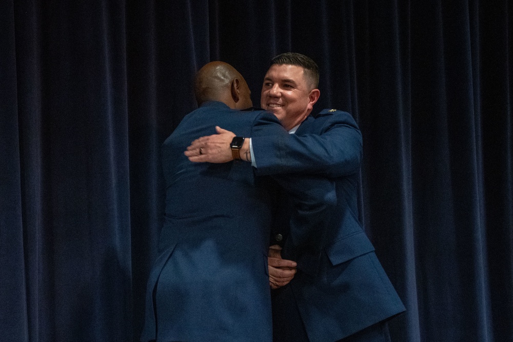 Maj. Gen. Ondra Berry, the Adjutant General for the State of Nevada, congratulates Maj. Robert Kolvet during his promotion ceremony