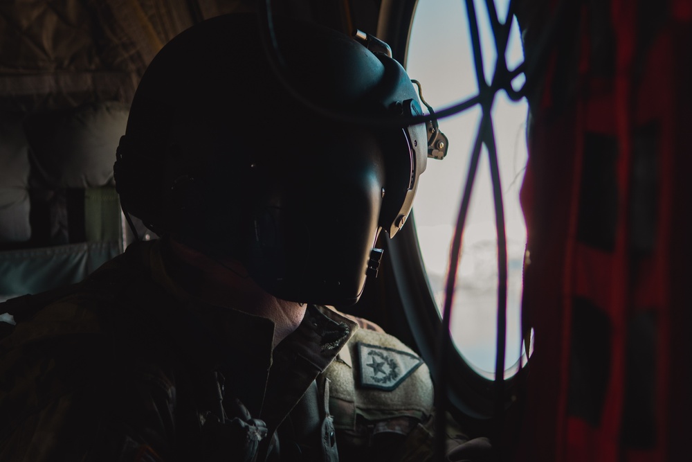Nevada Air Guard Airmen and Leadership fly on a Chinook over Lake Tahoe