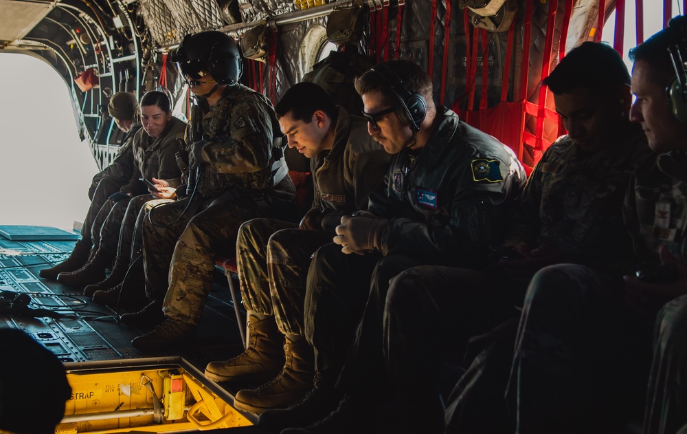Nevada Air Guard Airmen and Leadership fly on a Chinook over Lake Tahoe