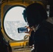 Nevada Air Guard Airmen and Leadership fly on a Chinook over Lake Tahoe