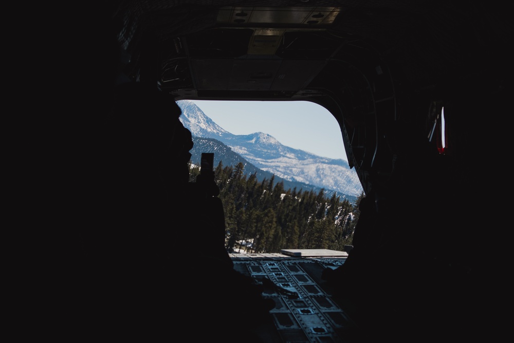Nevada Air Guard Airmen and Leadership fly on a Chinook over Lake Tahoe