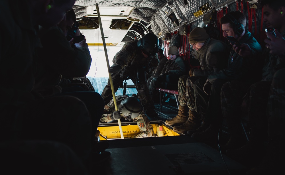 Nevada Air Guard Airmen and Leadership fly on a Chinook over Lake Tahoe