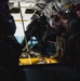 Nevada Air Guard Airmen and Leadership fly on a Chinook over Lake Tahoe