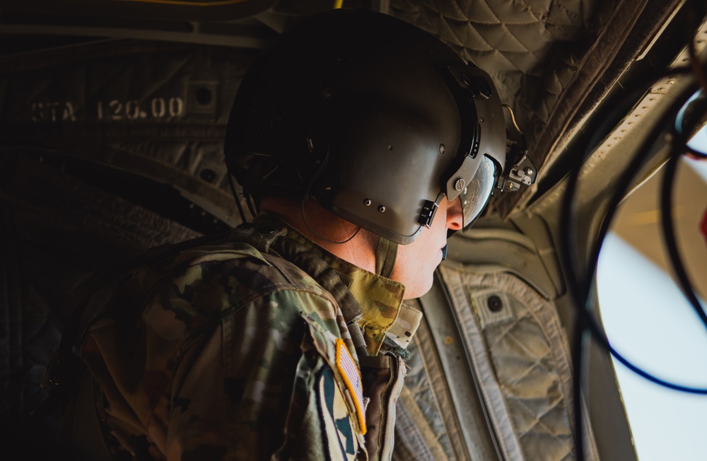 Nevada Air Guard Airmen and Leadership fly on a Chinook over Lake Tahoe