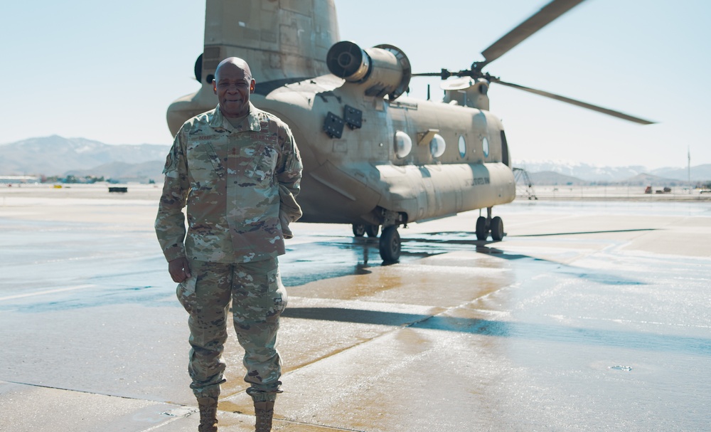 Nevada Air Guard Airmen and Leadership fly on a Chinook over Lake Tahoe
