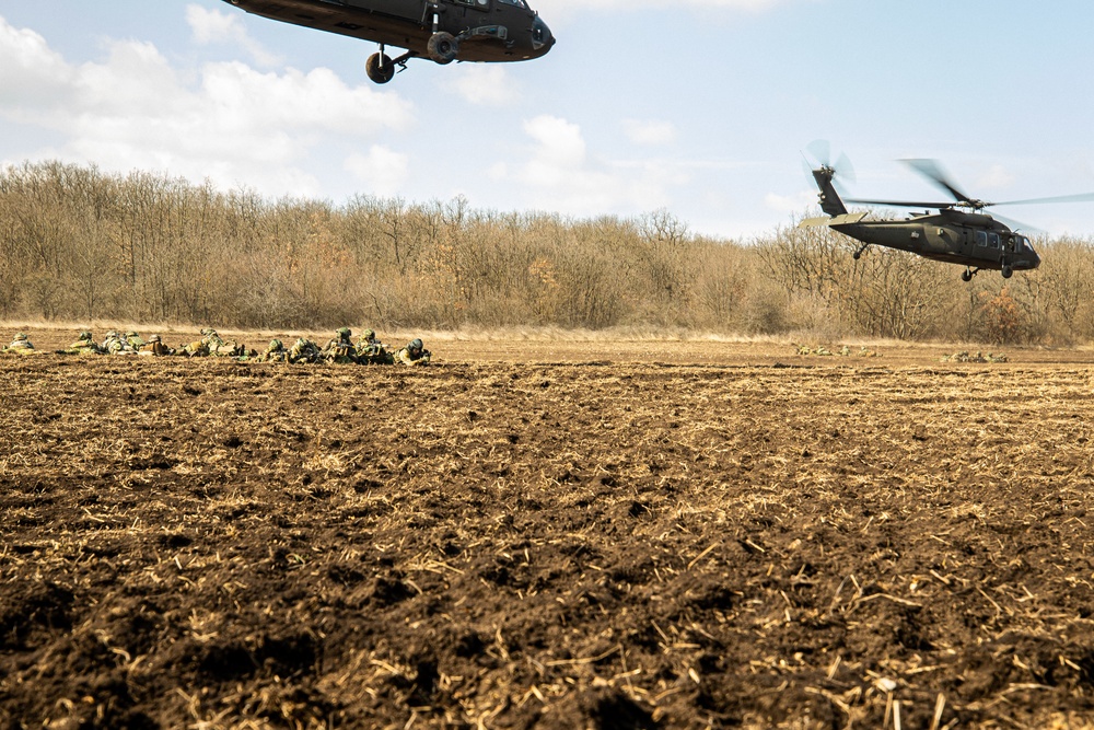 3rd Battalion, 227th Aviation Regiment plans and conducts sling load and air assault operations with the Royal Netherlands 11th Infantry Brigade during Rapid Falcon 2022