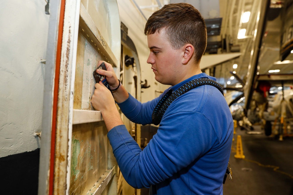 Abraham Lincoln Sailors conduct maintenance