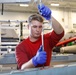 Abraham Lincoln Sailors conduct aircraft maintenance