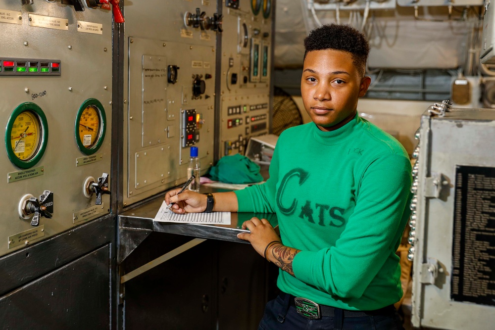 Abraham Lincoln Sailors pose for Women's History Month