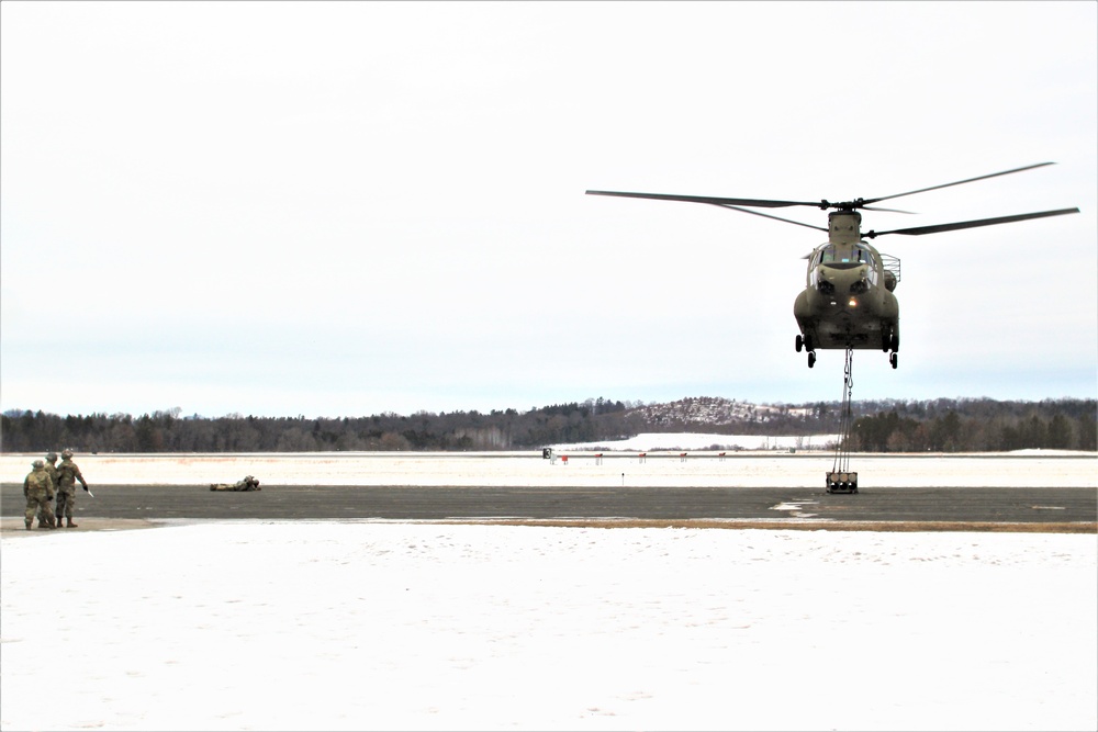CH-47 aircrew, 89B ASC students conduct sling-load training at Fort McCoy
