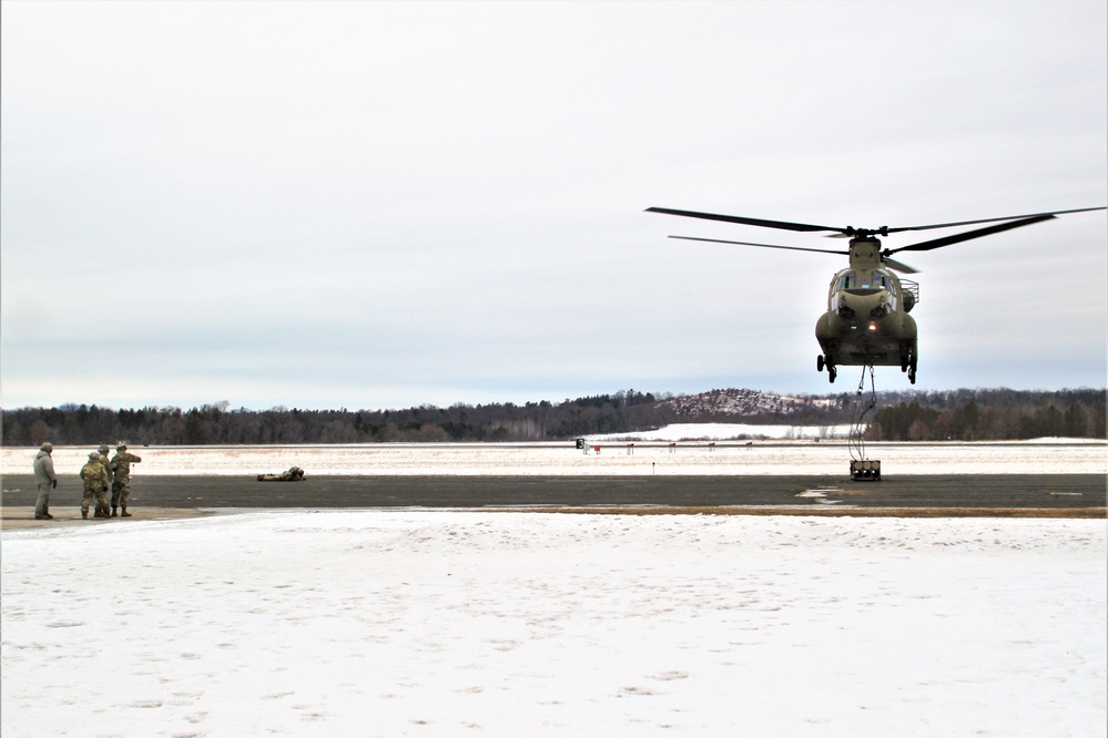 CH-47 aircrew, 89B ASC students conduct sling-load training at Fort McCoy