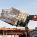 Shipping a piece of home overseas: service members work together to deliver mail