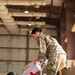 Shipping a piece of home overseas: service members work together to deliver mail