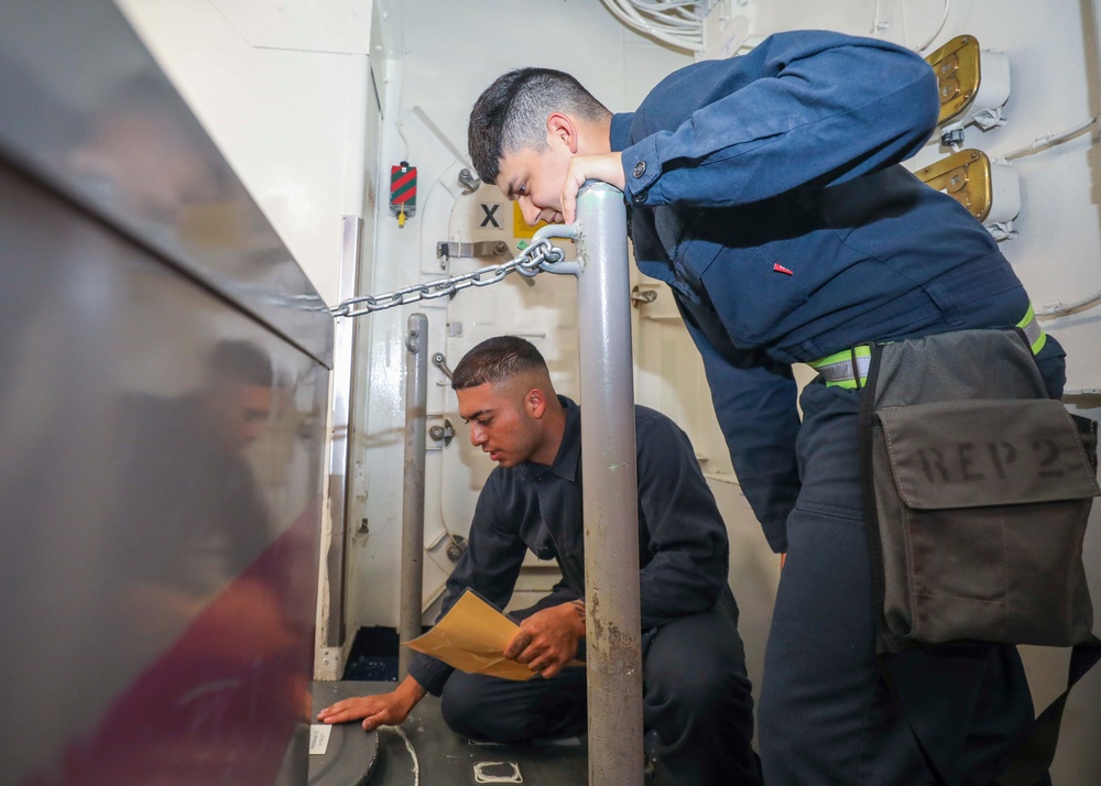 Sailors Inspect Valves During Drill