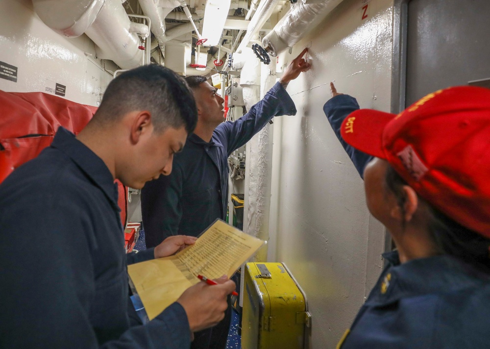 Sailors Inspect Valves During Drill