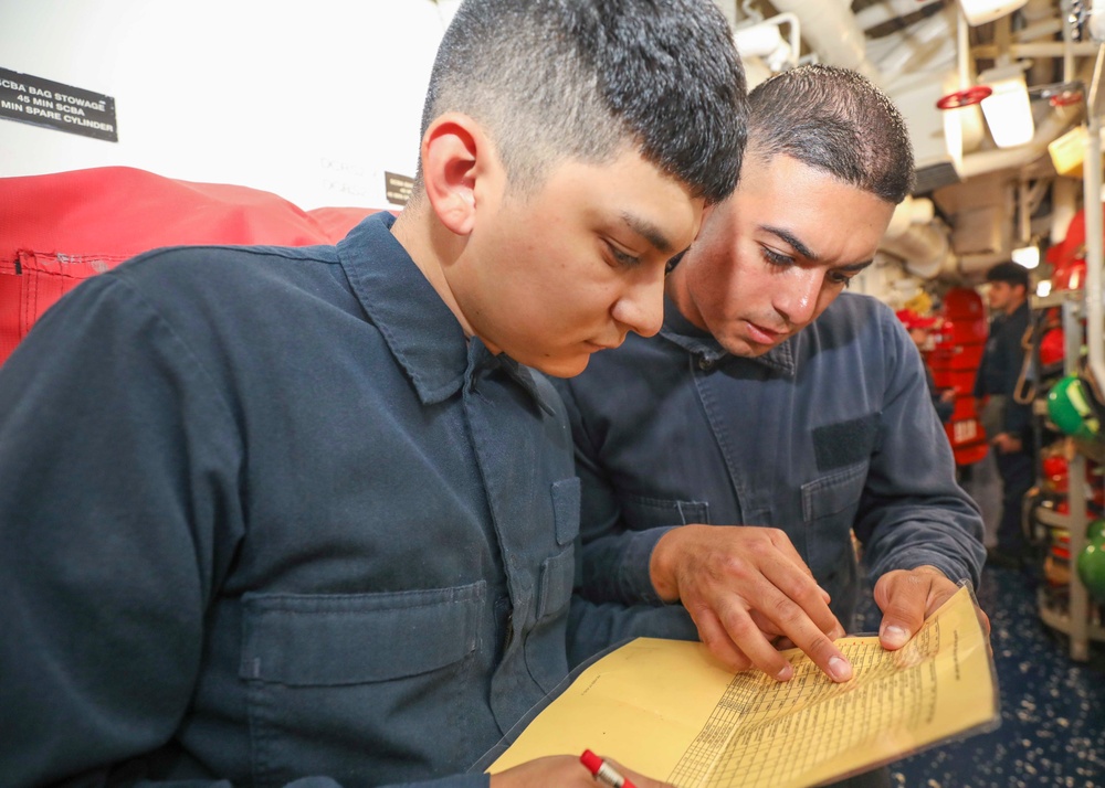 Sailors Inspect Valves During Drill