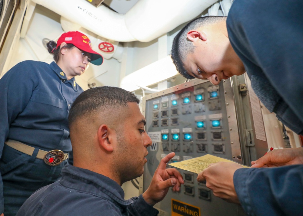 Sailors Inspect Valves During Drill