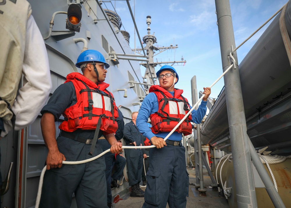 Sailors Prepare to Launch Small Boat