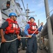 Sailors Prepare to Launch Small Boat