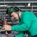 Abraham Lincoln Sailors conduct aircraft maintenance