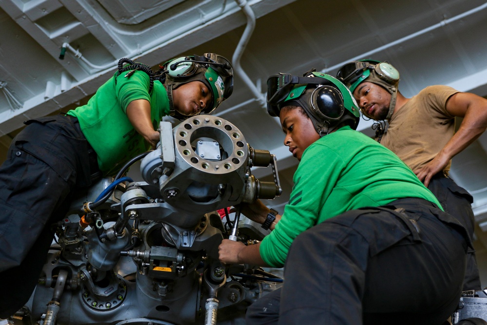 Abraham Lincoln Sailors conduct aircraft maintenance