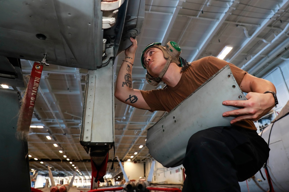 Abraham Lincoln Sailors conduct aircraft maintenance