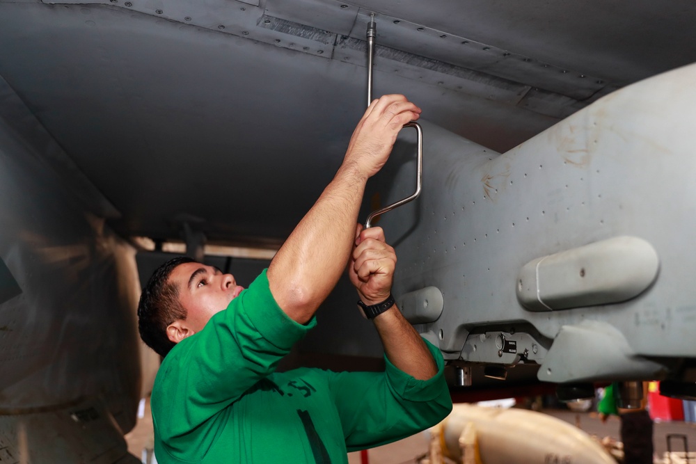 Abraham Lincoln Sailors conduct aircraft maintenance