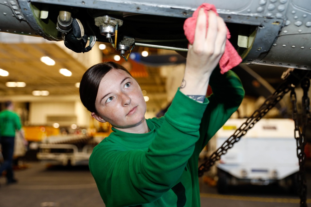 Abraham Lincoln Sailors conduct aircraft maintenance