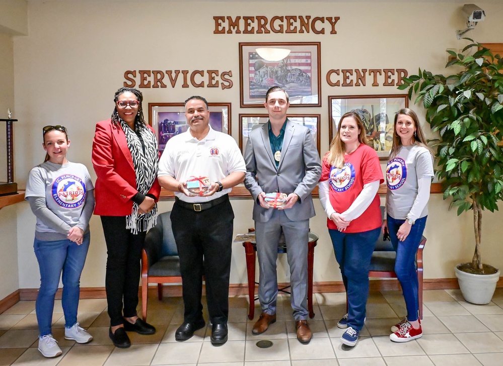 Teachers, principle deliver pies to P.I.E.s on Pi Day