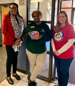 Teachers, principle deliver pies to P.I.E.s on Pi Day