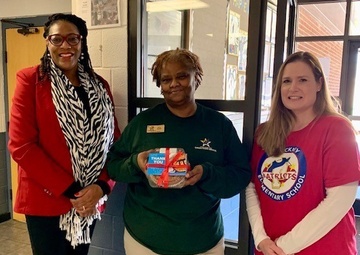 Teachers, principle deliver pies to P.I.E.s on Pi Day
