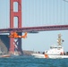 Coast Guard Bay Area assets pose for group photo with a 9/11 commemorative flag