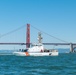 Coast Guard Bay Area assets pose for group photo with a 9/11 commemorative flag