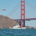 Coast Guard Bay Area assets pose for group photo with a 9/11 commemorative flag