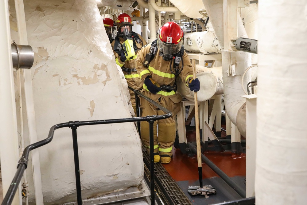 USS Ross Sailors conduct main space fire drill