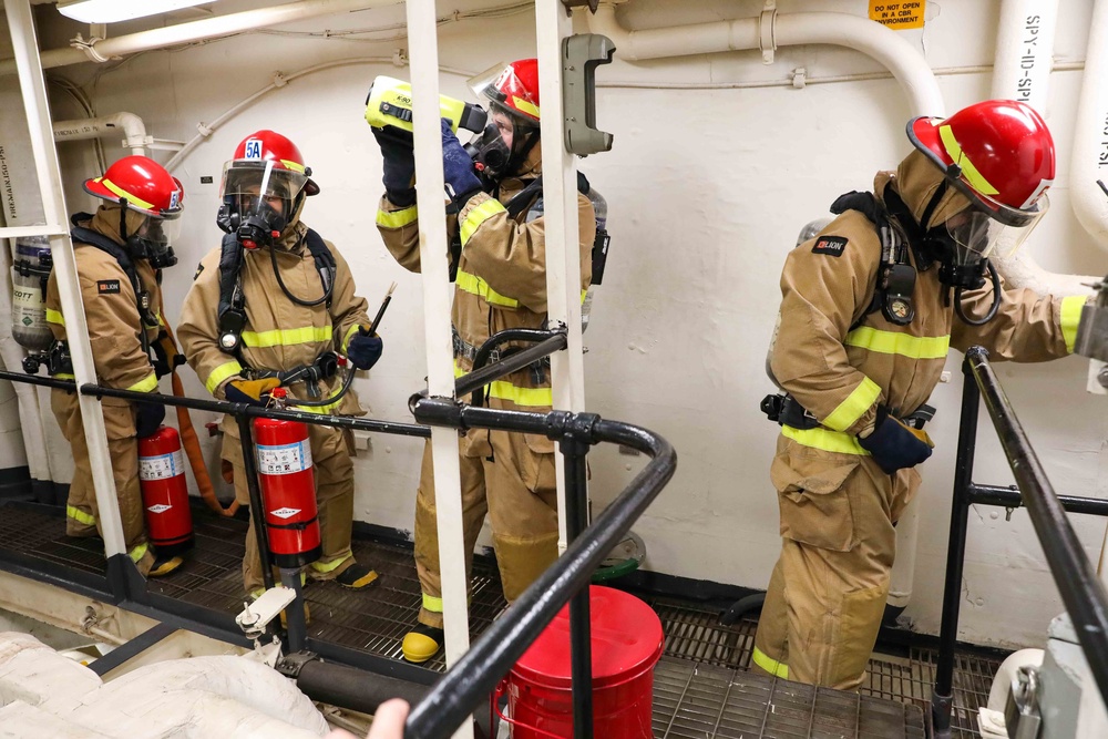 USS Ross Sailors conduct main space fire drill
