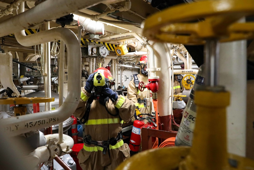USS Ross Sailors conduct main space fire drill