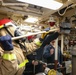 USS Ross Sailors conduct main space fire drill