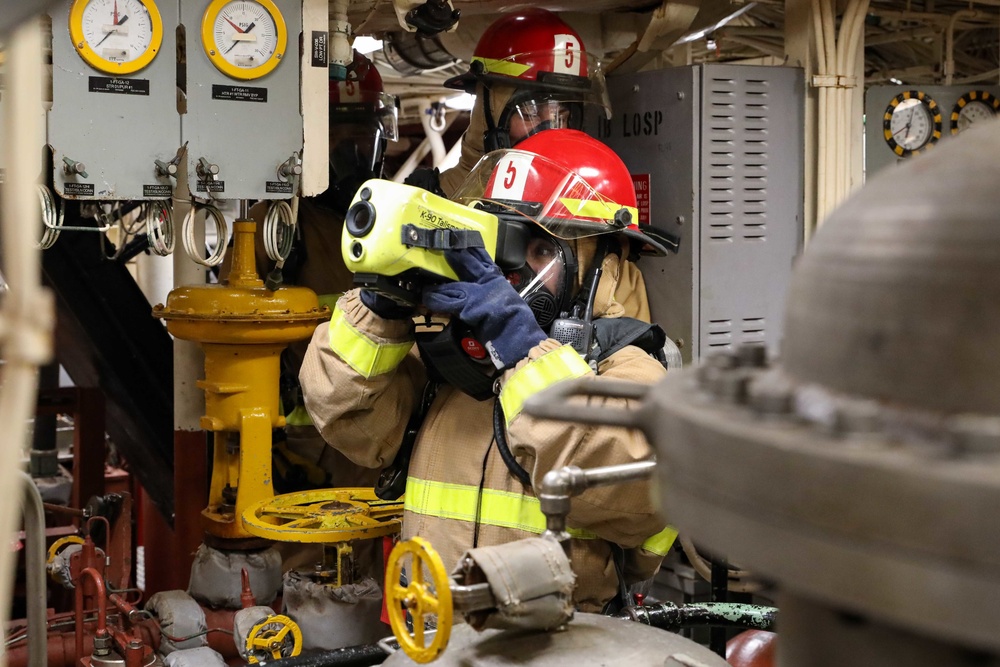 USS Ross Sailors conduct main space fire drill