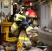 USS Ross Sailors conduct main space fire drill